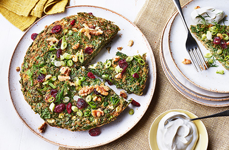 This bright and colourful Iranian-inspired omelette is made with fresh herbs and fragrant spices