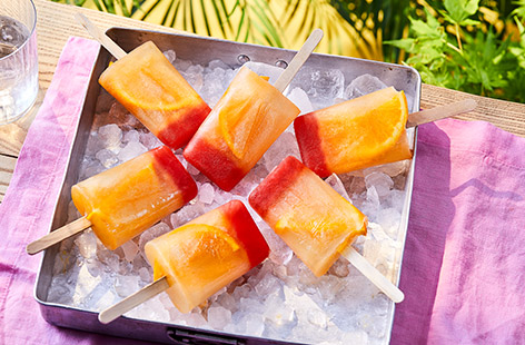 These grown-up Tequila Sunrise lollies are a fun, frozen twist on the classic beach cocktail