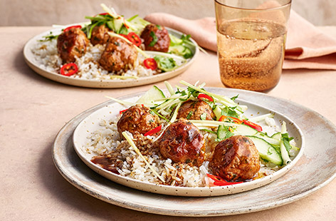 These homemade pork meatballs, made with lean pork mince, come together in just half an hour and are loaded with fresh, fragrant flavours like ginger, spring onion, coriander and lime. Stir-fried in a ready-made teriyaki sauce alongside the rice for a crispy finish, this dish will certainly shake up your midweek meals or enjoy for a Friday night fakeaway.