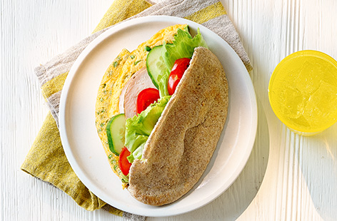 Get the kids to eat their greens with these ham and pea frittata sarnies