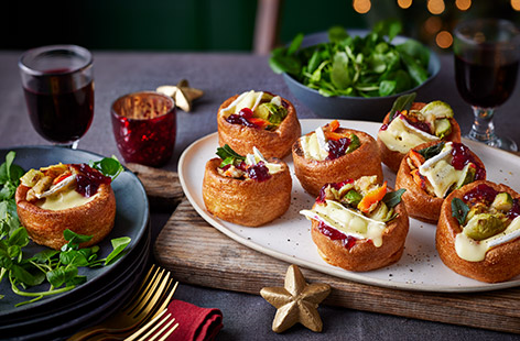 Bubble-and-squeak gets a modern makeover: a fluffy Yorkshire pudding is filled with festive leftovers with a good dollop of cranberry sauce for a lazy but lovely Boxing Day lunch. 