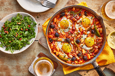 You can make the tomato base up to two days before you want to eat it (stored in the fridge), then simply reheat and cook the eggs and cheese to serve.