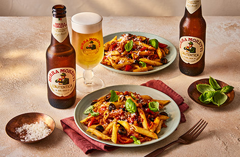 This quick and easy pasta sauce recipe is perfect for a speedy midweek meal. Arrabbiata is a classic Italian spicy sauce made of tomatoes, chilli and garlic. We’ve added black olives and a sprinkling of basil and Parmesan to make it that bit more special.
