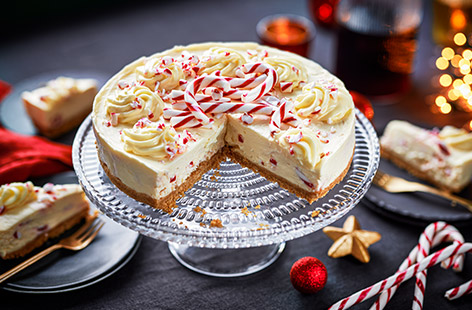 Get into full-on festive spirit with this fun candy cane cheesecake made with a crunchy biscuit base, creamy peppermint topping and, of course, plenty of candy canes. 