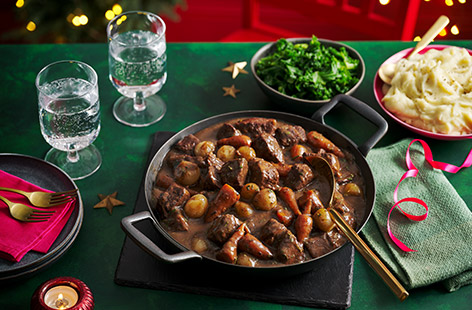 A warming one-pot of slow-cooked beef chunks with fresh veg, aromatic herbs and spices, and plenty of red wine