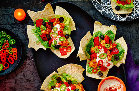Tacos just turned terrifying! What's not to love about this haunting Halloween dinner? It's fun and easy to make (with a bit of creative cutting to make the bat wing wraps). There's more: it's healthy and will fill hungry tummies before the all-important Trick or Treating. Don't save this for Halloween!