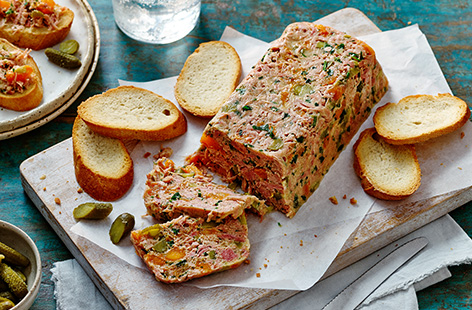 This delicious ham hock terrine is filled with apricots and cornichons