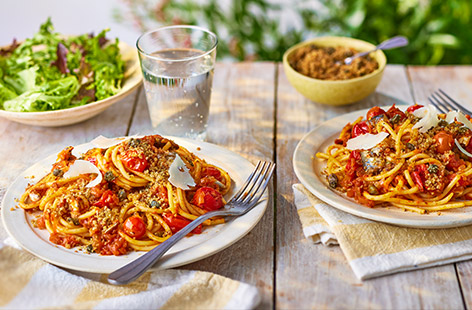 Storecupboard ingredients are given a glow-up in this simple pasta sauce, using Tesco Finest sardines, tinned cherry tomatoes and chilli flakes