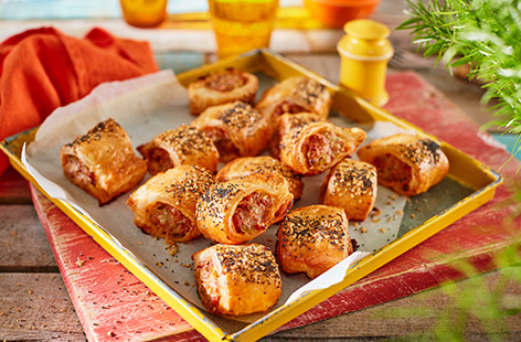 Fire Pit chorizo sausages are mixed with manchego cheese and green olives in this moreish Spanish-style sausage rolls recipe.