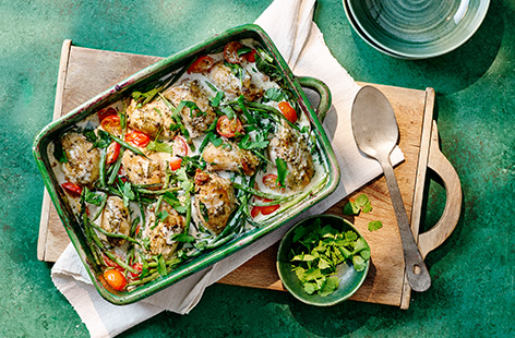 Make two meals in one with this easy Thai-inspired recipe. Roasted succulent chicken thighs in a Thai green curry sauce are serve with sticky jasmine rice and plenty of fresh coriander with two portions reserved for a zingy noodle salad the next day.