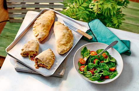 The classic tuna melt gets an Italian makeover encased in pizza dough for a fresh, summery calzone