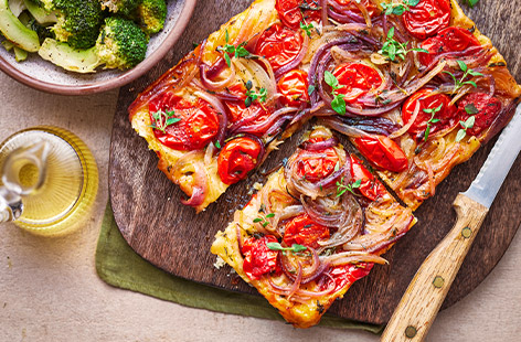 This vibrant tomato tart is simple and speedy to make, yet looks so attractive and tastes amazing. Herby baked veg is cooked underneath reduced-fat puff pastry (we've used ready rolled to save time) then flipped for an upside-down creation. Healthy, vegan and dairy-free, this recipe delivers on so many levels!