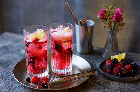 Having a Valentine's night in? Start the evening with this vibrant Valentine's gin cocktail, mixed with sweet raspberry and rose lemonade and a scattering of frozen fruit. This is an easy, elegant tipple for two for Valentine's Day or any cosy evening in.