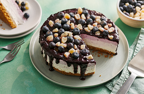 This showstopping Pride cheesecake has an ombre effect from blueberry purée stirred through the filling and is topped with crystallised ginger and fresh blueberries. Bethany is an amateur baker and nutritionist and calls this her ‘ace cheesecake’ – the blueberries give the cheesecake a purple hue which is the same colour it represents for ace on the Pride flag. 