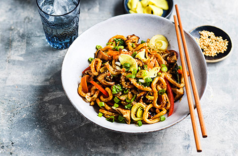 This Yaki udon noodle dish is jam-packed with veggies, coated in a sticky sauce and topped with a quick pickled ginger for extra flavour. Perfect for a speedy and healthy weeknight dinner!