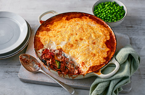 Moussaka is made easy with this veggie moussaka-style bake, using supermarket shortcuts for a chargrilled Mediterranean veg filling and rich, creamy topping for a hearty family meal.
