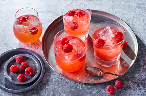 Shake up a duo of celebratory cocktails with this raspberry whisky sour recipe that adds a fruity twist to a bartender favourite.