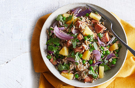 Add a tropical twist to fried rice with this colourful supper recipe for all the family