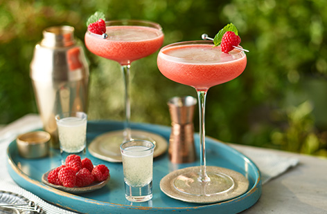 Try making this berry pink drink for your next cocktail night. Fresh raspberries, passion fruit and vanilla vodka make for a delicious combination. Serve with a shot of Prosecco on the side!