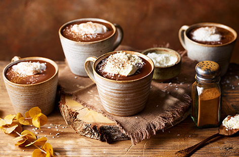 Curl up on the sofa with a cup of boozy coconut hot chocolate with this easy recipe. Using coconut milk, whipped coconut cream, warming cinnamon and spiced rum, it's the perfect autumnal drink.