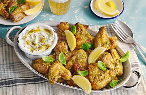 Give your wings a herby zesty kick with a jar of pesto a squeeze of lemon