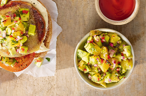 Use tinned pineapple to make this tangy salsa - perfect on top of burgers. Try whipping this up for your next barbecue.