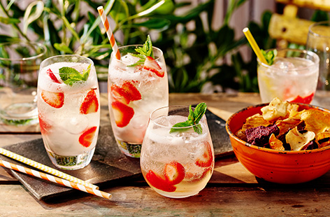 Use fresh strawberries, fragrant lemongrass and fiery ginger to create a refreshing summer spritz in this make-ahead cocktail recipe. The syrup can be made up to 1 week ahead and all you need to do is top up with fizz, ice, soda water and sliced strawberries.
