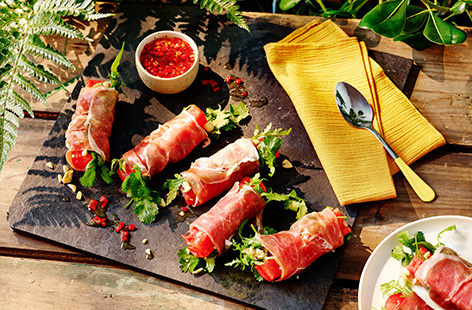 Get your next dinner party off to a smashing start with this easy make-ahead starter recipe. Simply wrap up refreshing watermelon with peppery rocket, salted peanuts and fresh coriander and serve with a tangy lime and chilli dipping sauce.