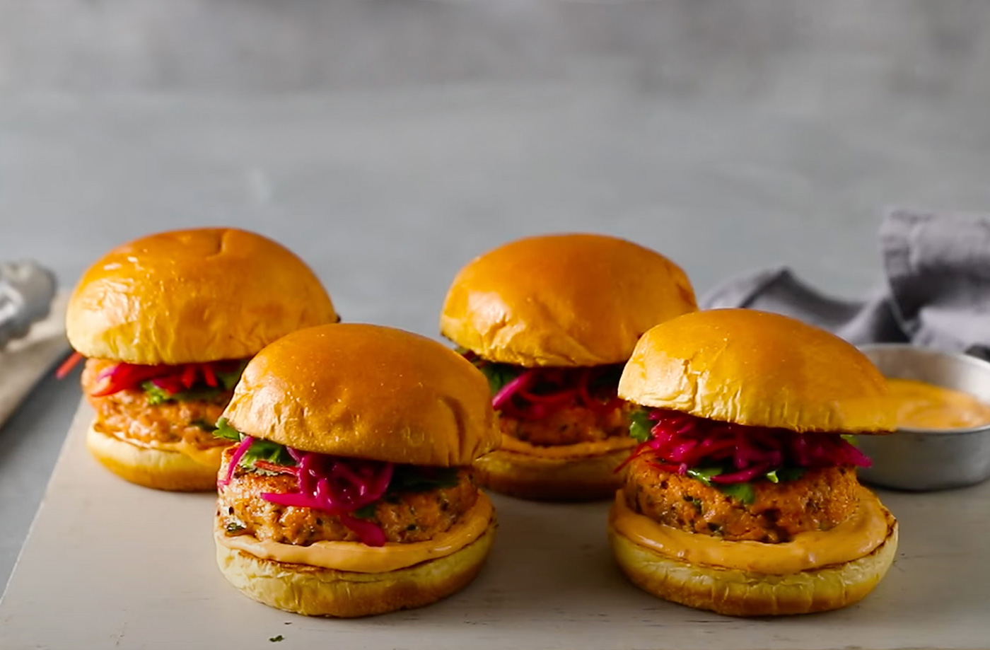 Spicy salmon burgers with slaw recipe