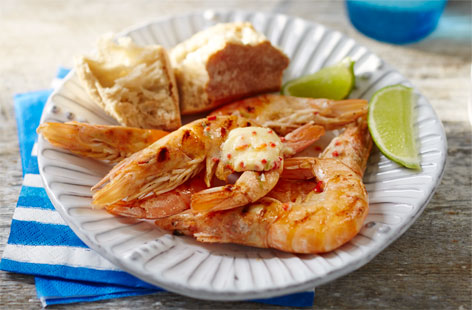 Don't miss out on those rays of sunshine with this speedy barbecue idea. Cook juicy prawns on the barbecue in just a few minutes, and dip them in a vibrant and zingy chilli, garlic and lime butter while they're still hot