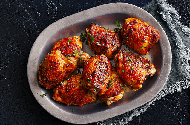 Sticky honey, garlic and harissa chicken thighs