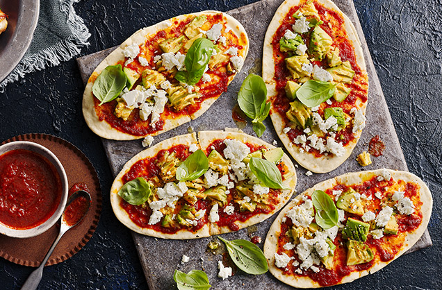 Harissa, avocado and feta flatbreads