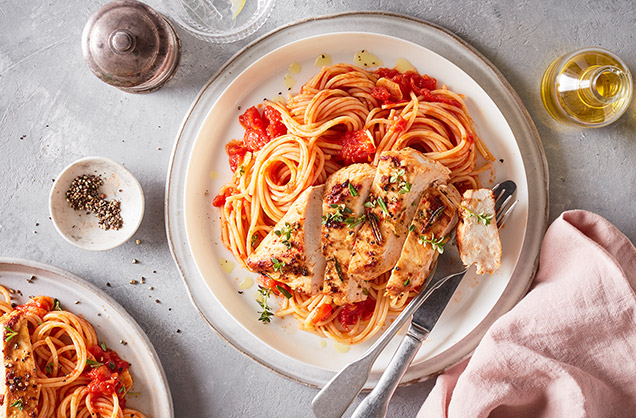Olive oil and herb marinated chicken with tomato spaghetti