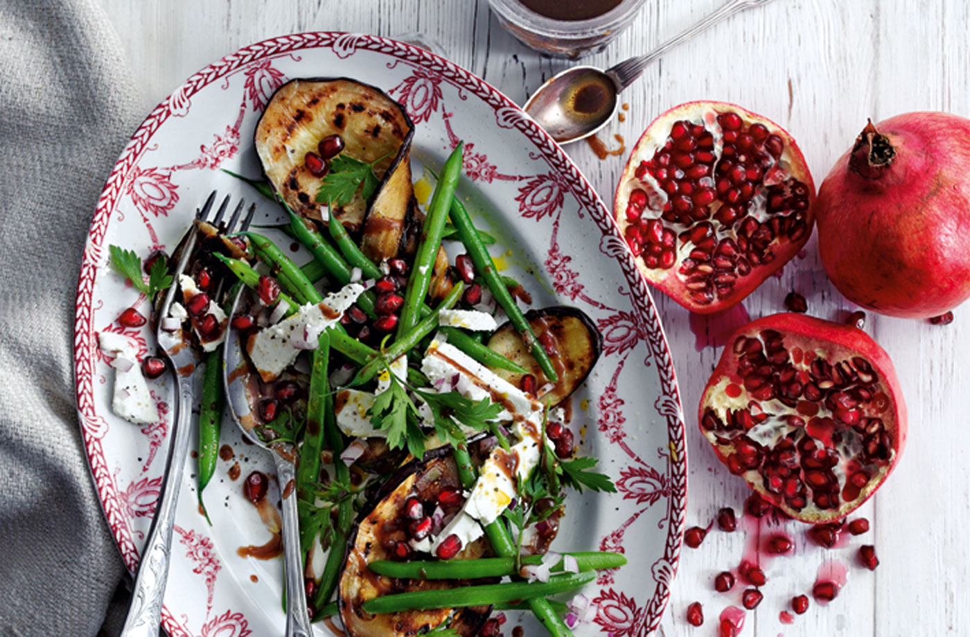 Grilled aubergines with green beans, feta and pomegranate seeds recipe