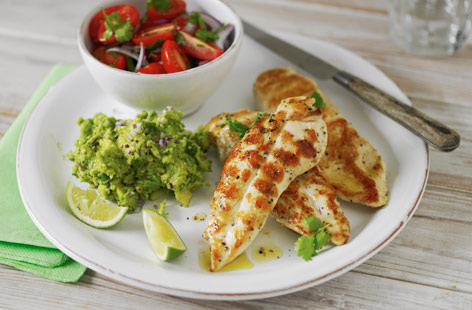 Easy, tasty and healthy, this dish is sure to become a summer family favourite. Save time with shop-bought guacamole, but make your own salsa by combining baby plum tomatoes, red onion, coriander and lime. Serve alongside the chicken on a bed of rice.