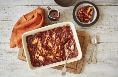 A decadent twist on a British classic, this chocolate bread and butter pudding has the unbeatable richness of chocolate and cream with lively orange zest to wake up the tastebuds - a perfect way to end a special meal or for when only the best chocolate pudding recipe will do.