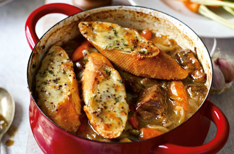 This Belgian-style beef and ale stew with cheesy croutons is a dish that'll certainly line the stomach. The combination of the dark beer-infused stew with Comté-crusted slices of toasted baguette is heady in all the right ways. Well worth the time commitment.