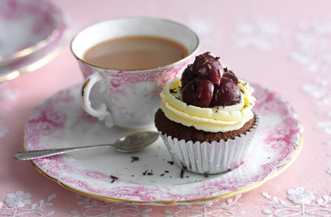 These delicious cupcakes are a clever spin on a retro classic, black forest gateaux. Combining sweet and juicy cherries with a decadent sponge and an optional glug of Kirsch, they are sure to go down a treat at your afternoon tea.