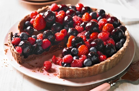 A rich, chocolate twist on a classic fruit tart filled with luxe crème pâtissière