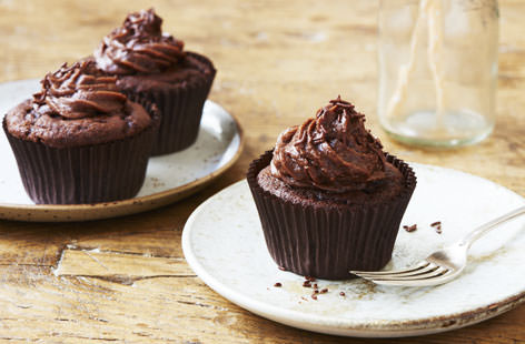 The ultimate chocolate cupcake recipe, perfect for a chocolate-lover – learn how to make chocolate cupcakes in just a few simple steps. With a towering swirl of chocolate buttercream on top of fluffy chocolate sponge, they are the ideal treat for a party, bake sale, or just to have with a cup of tea. If you don't have a piping bag, just swirl the buttercream on top with a spoon.