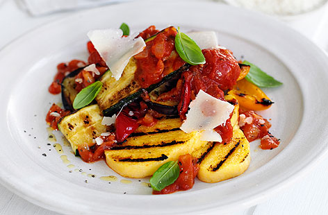 Ready-made polenta buys you time in this easy, speedy vegan supper that stacks healthy roasted peppers, aubergines and courgettes on top of filling and versatile polenta. Chargrilled to add a smoky flavour this is a midweek meal you'll keep coming back to.