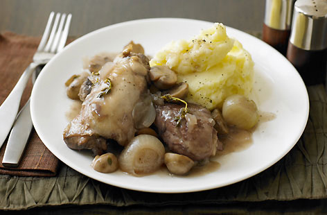 A coq-au-vin inspired chicken casserole with sweet shallots, rich red wine and buttery mushrooms, accompanied by a special mash: Perfect for a wintery, intimate dinner party. A whole bulb of garlic is roasted for the mash, making this meal as French as it comes.