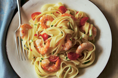 A quick and easy seafood pasta with crunchy freshly grated courgette, sweet prawns and more-ish tagliatelle. Increase the amount of chilli if you want more spice and finish with a grating of lemon zest for extra zing.