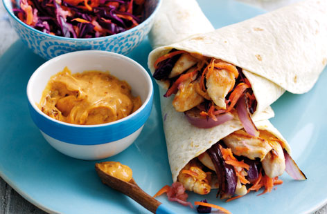 Sometimes life calls for a chicken wrap and these chipotle mayonnaise-flavoured numbers hit all the right notes. Served alongside a winter slaw with apple, cabbage and carrot, the wraps are filled with fried onions and tender paprika-coated chicken pieces.