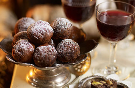 Bring a touch of class to your next supper party with these milk chocolate truffles made from melted chocolate, chunks of almond and crushed crunchy bars.