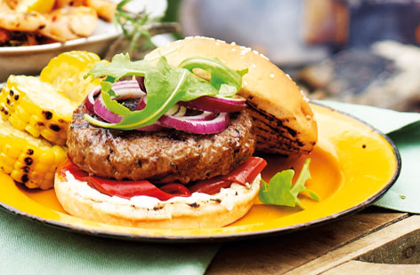 Add some extra heat to your burger with this delicious chorizo and beef patty. The aioli couldn't be easier: simply combine mayonnaise and garlic with some seasoning. Serve with the roasted red peppers, red onion rings and rocket.