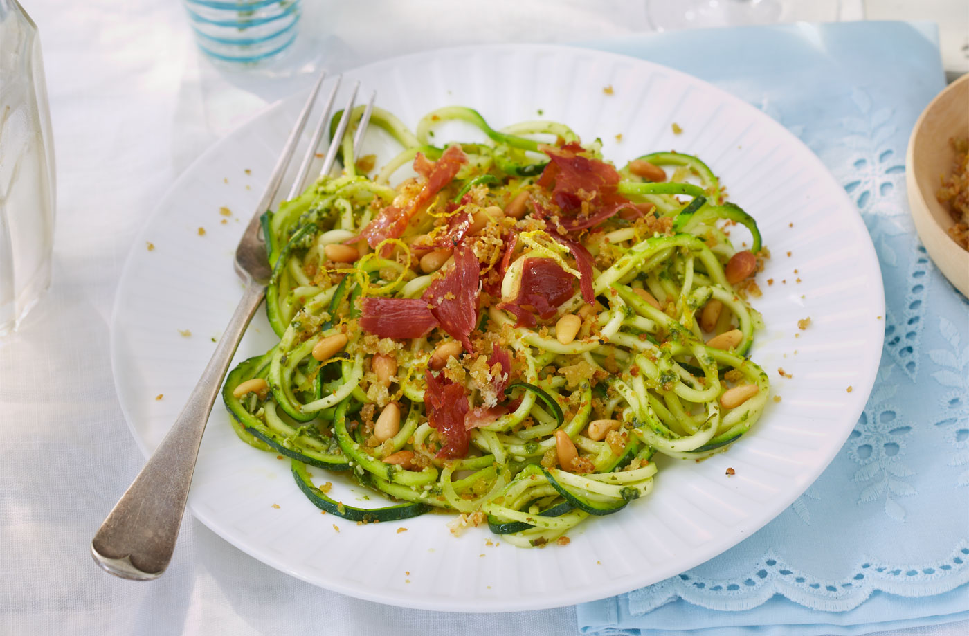 Courgetti with pesto, Parmesan crumbs and Parma ham recipe