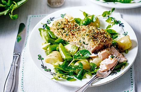 A light, fresh salad of Charlotte potatoes, lamb's lettuce, sugar snap peas and spring onion, topped with baked salmon fillets with a crispy, zesty couscous crust. This easy salmon recipe gives a delicious salad and quick dinner idea