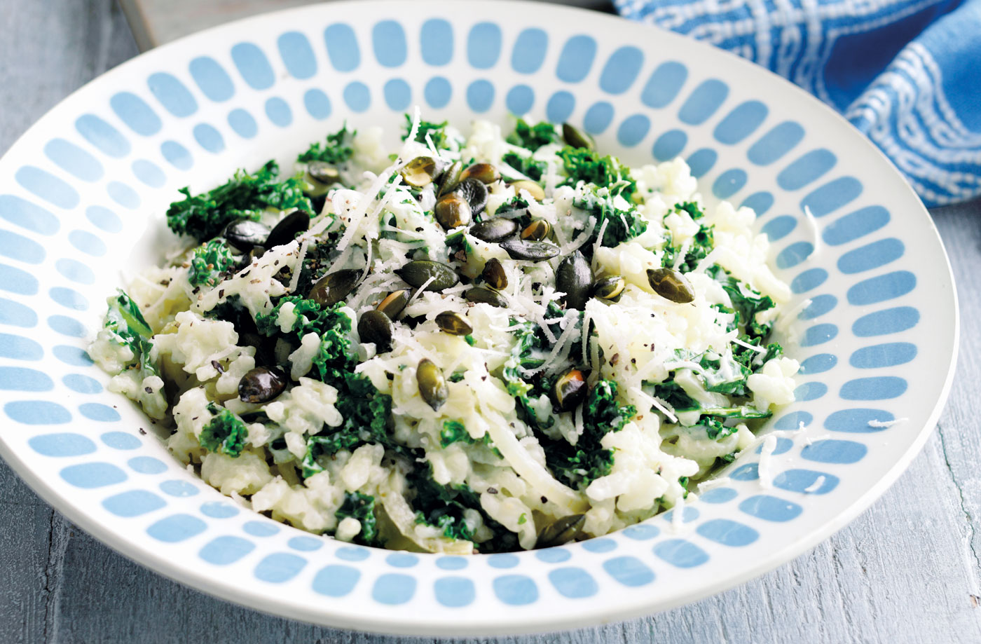 Baked kale risotto with pumpkin seeds recipe