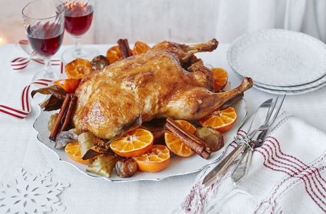 Slow-cooked until tender and coated in a mouthwateringly sticky glaze, this duck is a stunning centrepiece to serve up on Christmas day. Serve with roasted shallots, juicy clementines and cinnamon sticks for a wonderfully festive main.